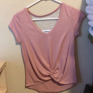 Pink shirt with lace on the back
